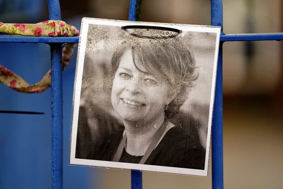 A photograph of Ruth Perry was attached to the fence outside John Rankin School in Newbury, Berkshire (PA)