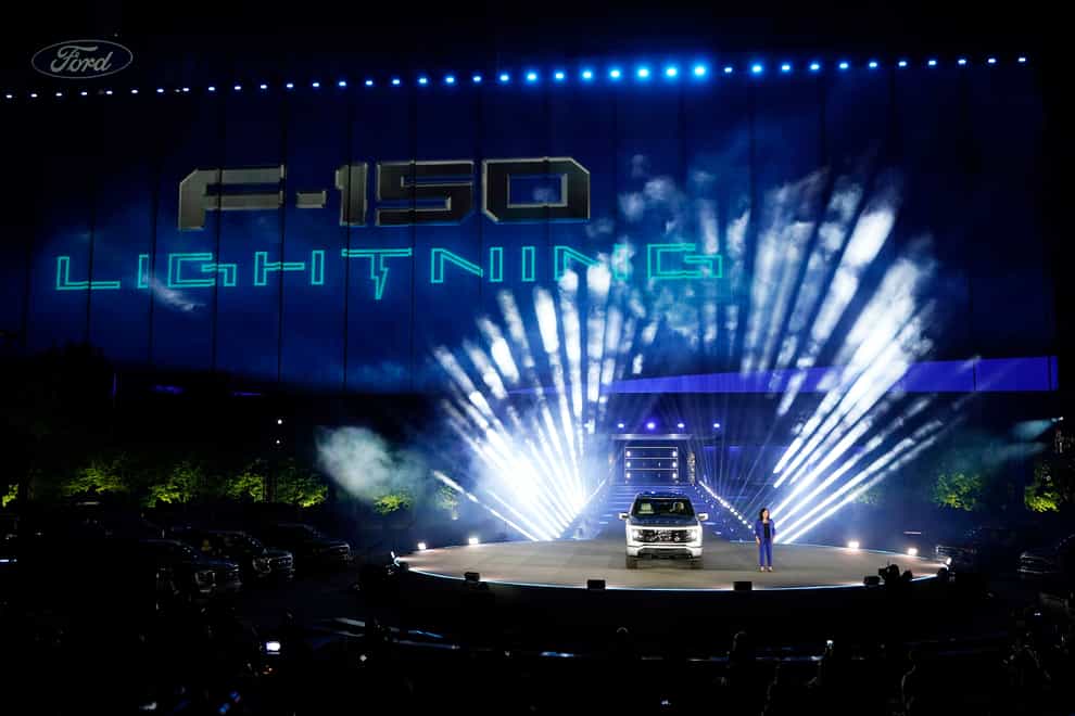 Ford’s chief executive engineer Linda Zhang unveils the Ford F-150 Lightning in May 2021 in Michigan (Carlos Osorio/AP)