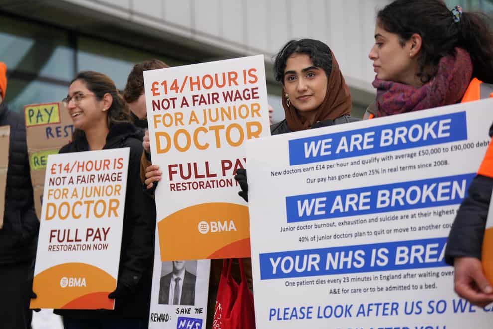 Striking NHS junior doctors on the picket line outside Queen Elizabeth Hospital in Birmingham during a previous strike (Jacob King/PA)