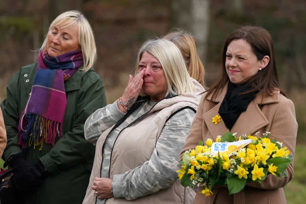 A silence was held in Pollok Park, Glasgow, to remember those who died from Covid (Andrew Milligan/PA)