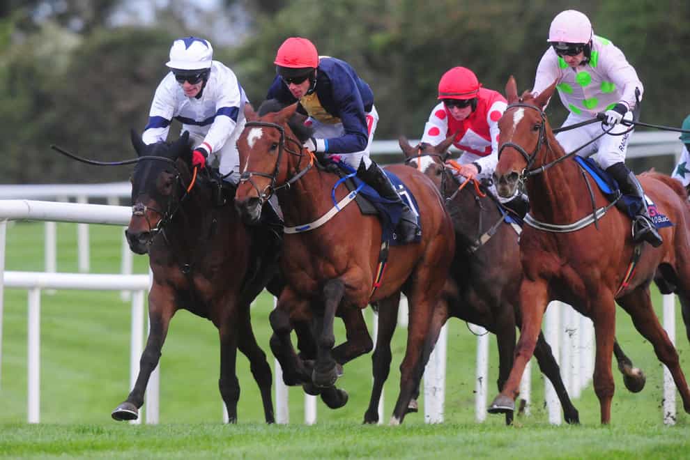 Longhouse Poet (red cap) has come out of his race at Down Royal well, according to trainer Martin Brassil (PA)