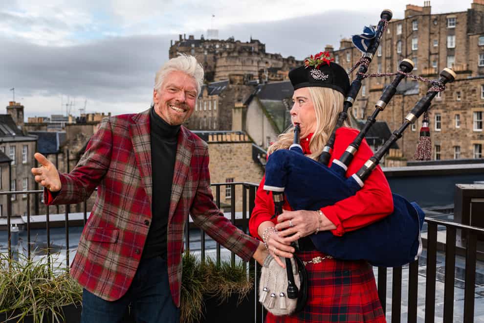 Richard Branson and piper Louise Marshall celebrates the opening of his new hotel in Edinburgh (Euan Cherry/PA Wire)