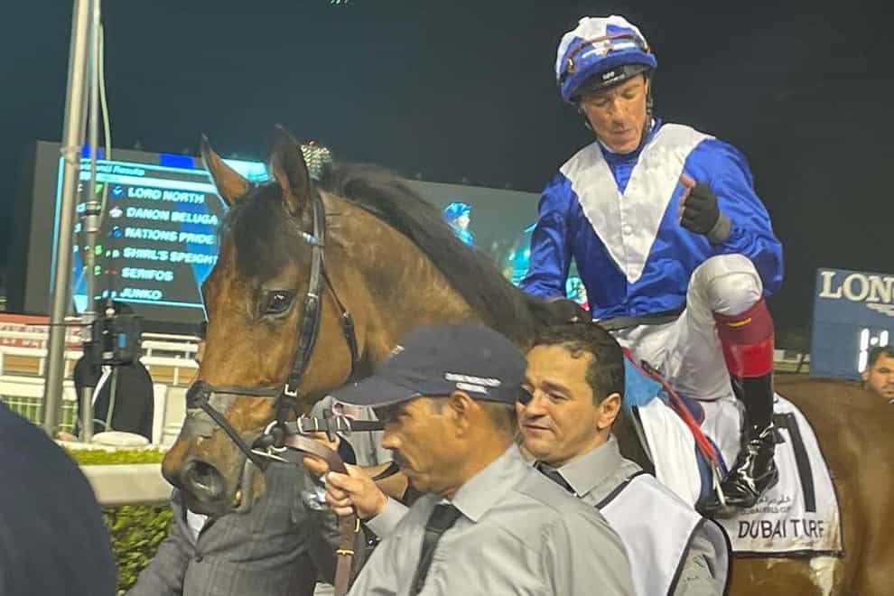 Frankie Dettori and Lord North after success in the Dubai Turf at Meydan Racecourse, (Neil Morrice/PA)