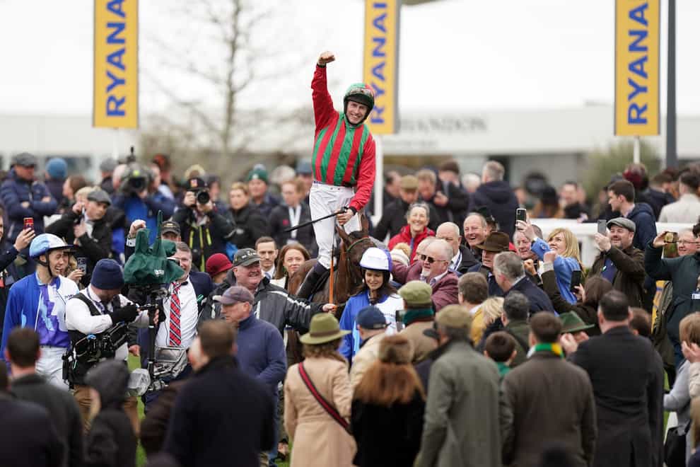 Liam McKenna celebrates after winning the Pertemps Network Final Handicap Hurdle aboard Good Time Jonny on day three of the Cheltenham Festival at Cheltenham Racecourse. Picture date: Thursday March 16, 2023. (Mike Egerton/PA)
