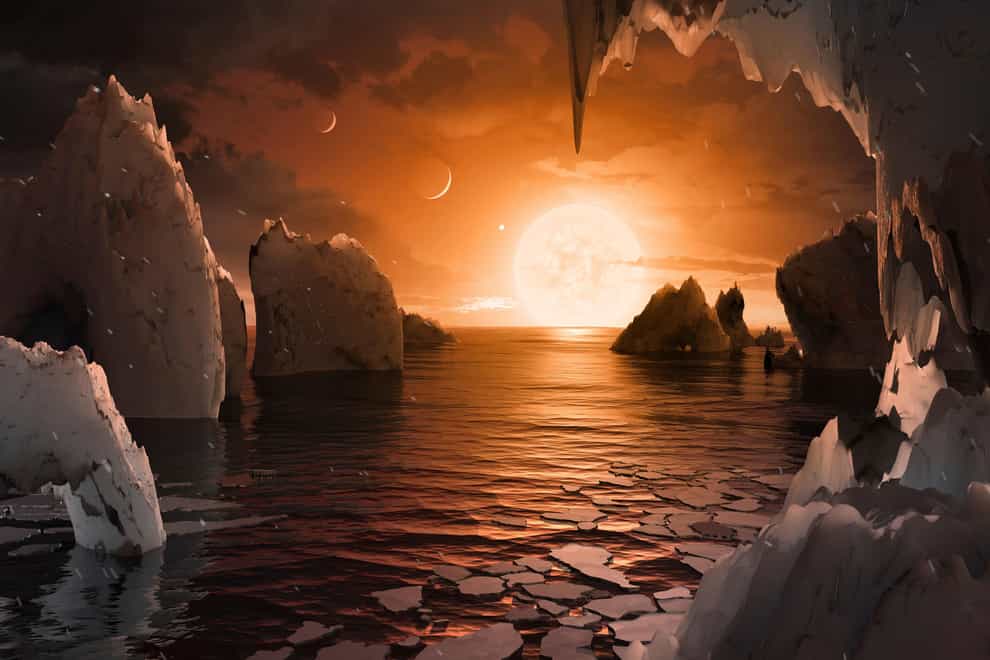 An artist’s impression of what the surface of the exoplanet Trappist-1f may look like (Nasa/JPL-Caltech/AP)