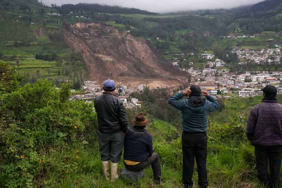 The landslide was caused by heavy rain (Dolores Ochoa/AP)