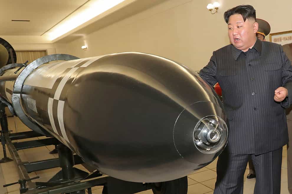 North Korean leader Kim Jong Un has called for his nuclear scientists to increase production of weapons-grade material, according to state media (Korean Central News Agency/Korea News Service via AP)