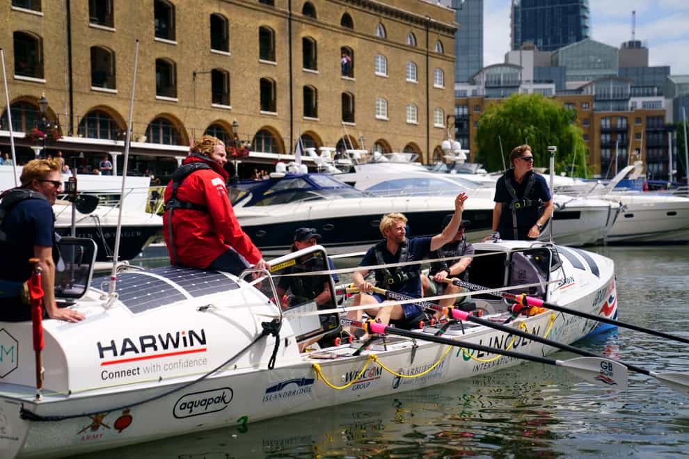Crew from team Albatross, including Olympic rower Andrew Triggs Hodge (centre), leave the start point of the GB Row Challenge in St Katherine Dock in central London (Victoria Jones/PA)
