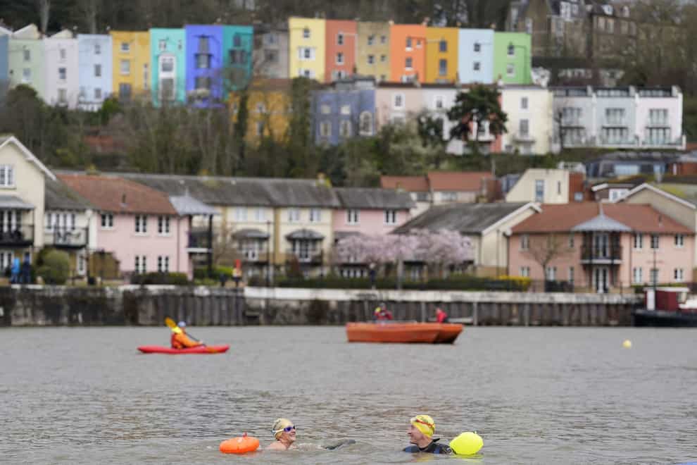 Swimmers David and Karen Quartermain on a temporary course in Baltic Wharf (Andrew Matthews/PA)
