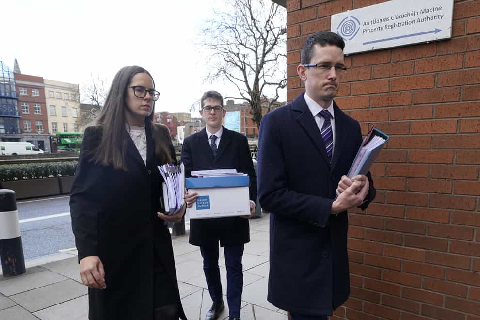 Irish teacher Enoch Burke (right), his sister Ammi Burke, and brother Isaac Burke (back) arriving at the High Court in Dublin for the legal case between Mr Burke and Wilson’s Hospital School. Picture date: Tuesday March 28, 2023.