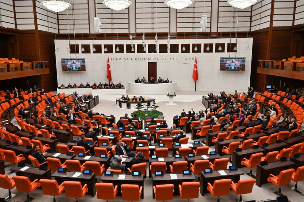 Turkish legislators vote in favour of Finland’s bid to join Nato at the parliament in Ankara (Burhan Ozbilici/AP)
