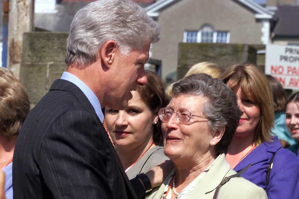 Former US president Bill Clinton meets Joan Wilson, wife of former senator Gordon Wilson and mother of Marie Wilson, a victim of the Poppy Day bombing in November 1987, at the site where the bomb went off in Enniskillen, Co Fermanagh (PA)