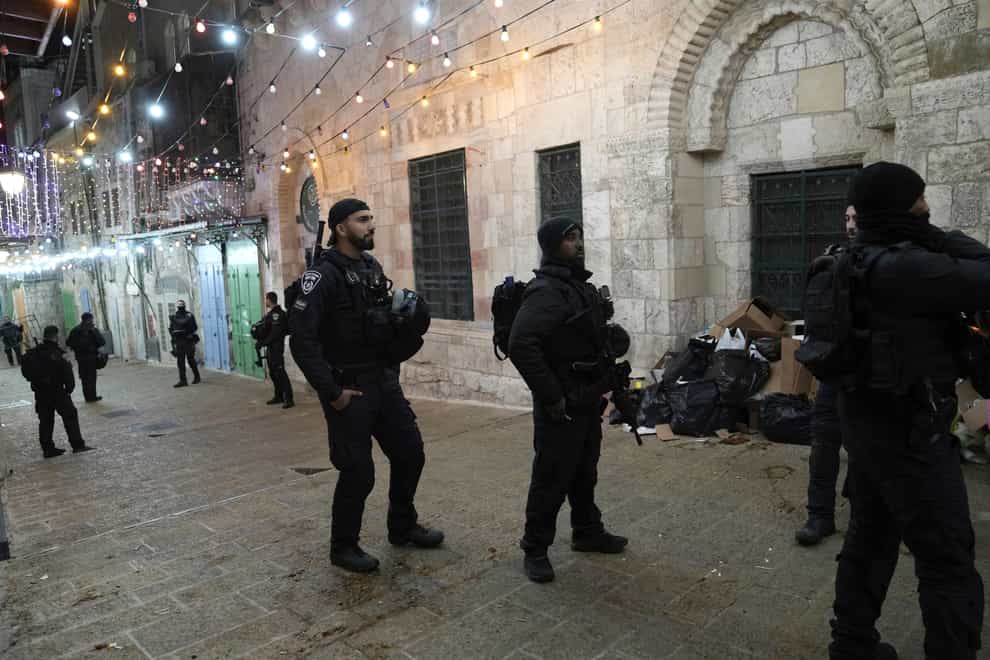 Israeli police are deployed near the Al-Aqsa Mosque compound after shots were fired in the Old City of Jerusalem during the Muslim holy month of Ramadan, Saturday, April 1, 2023. (AP Photo/ Mahmoud Illean)