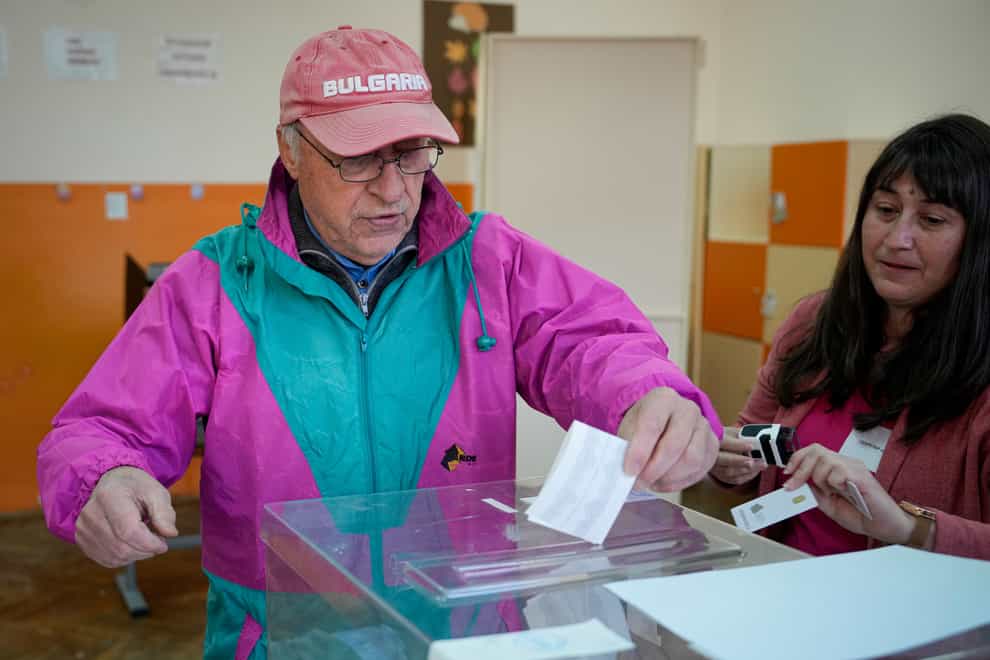 A man casts his vote at a polling station in Bankya, on the outskirts of Sofia, Bulgaria (Vadim Ghirda/AP)