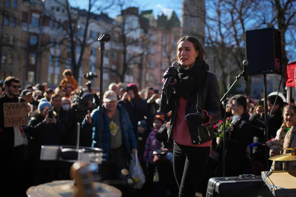 Finnish Prime Minister Sanna Marin addresses supporters during a campaign rally in Helsinki (Sergei Grits/AP)