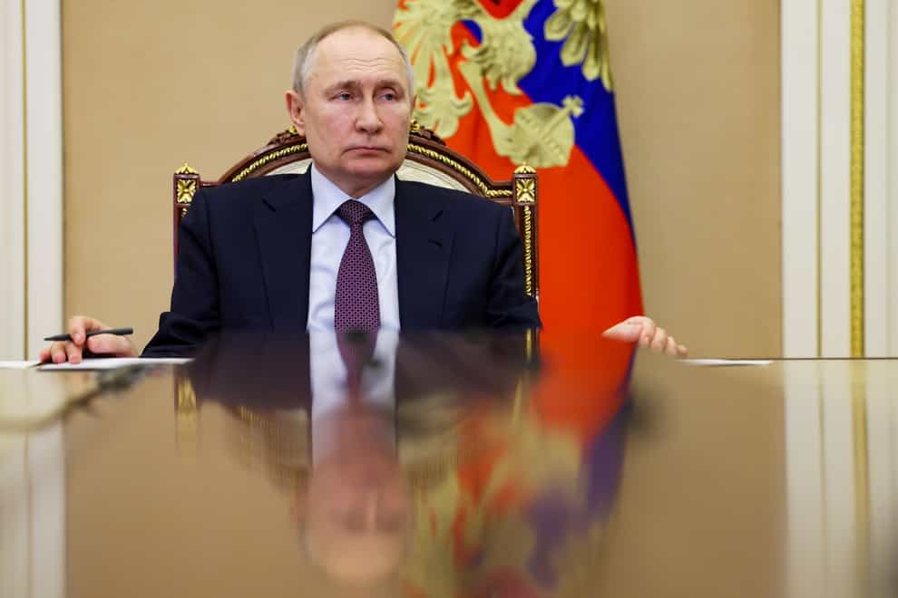 An international arrest warrant has been issued for Russian President Vladimir Putin (Gavriil Grigorov/Sputnik/Kremlin pool photo/AP)
