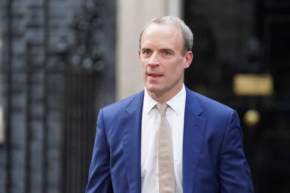 Dominic Raab has been urged to ‘move forward’ with plans to force criminals to attend their sentencing hearing (PA)