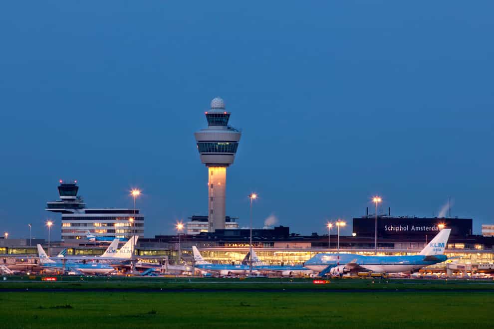 Flights in the early hours will be banned at Schiphol Airport (Alamy/PA)