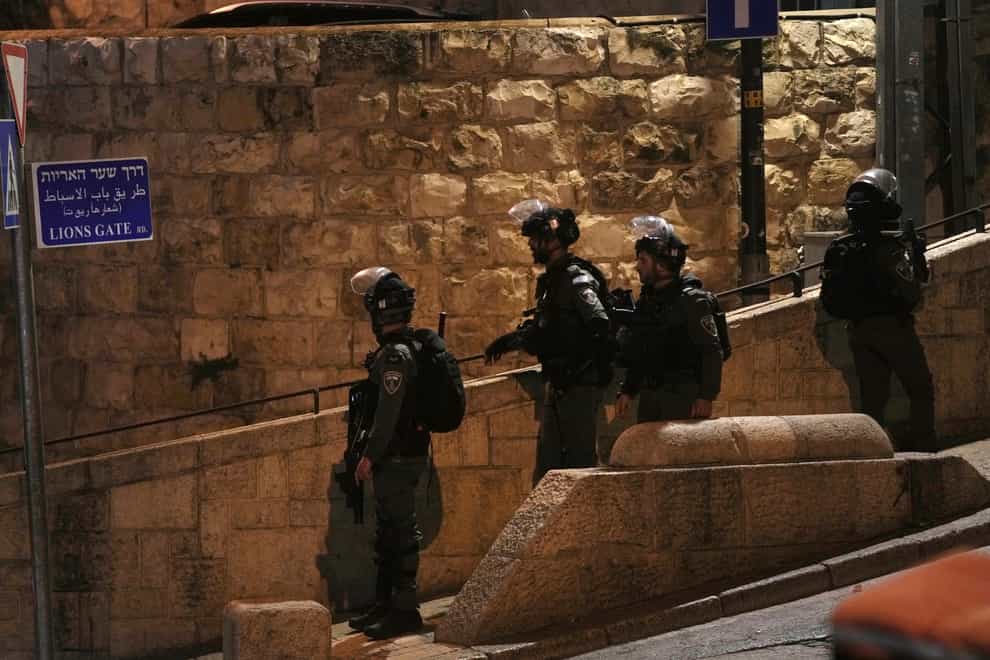 Israeli Border Police are deployed near the Lions’ Gate to the Old City of Jerusalem during a raid by police at the Al-Aqsa Mosque compound, Wednesday, April 5, 2023. (Mahmoud Illean, AP Photo)