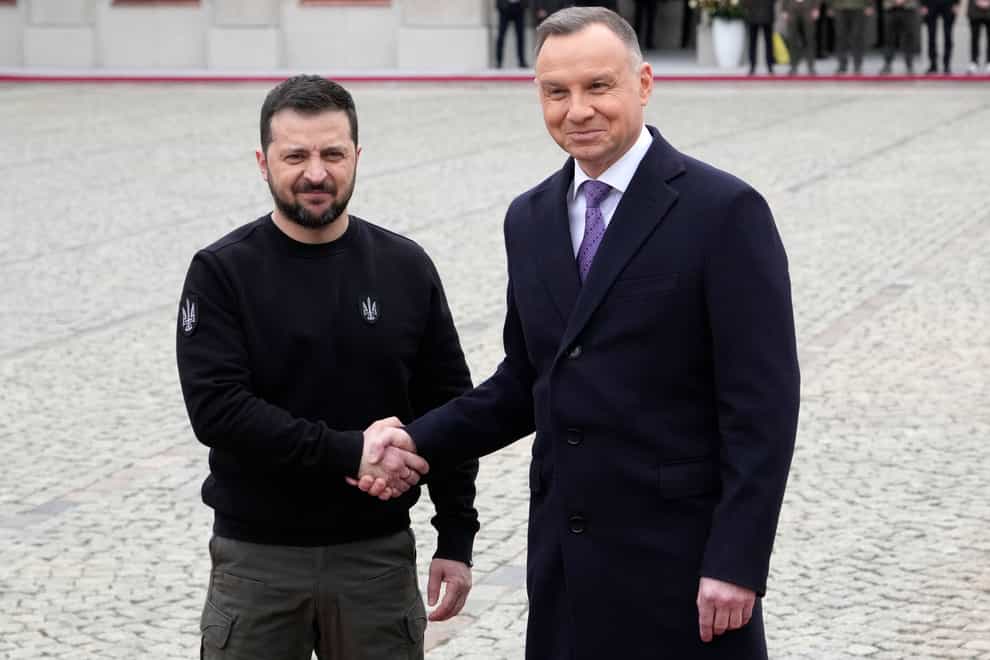 Poland’s President Andrzej Duda welcomes Ukrainian President Volodymyr Zelensky (Czarek Sokolowski/AP)