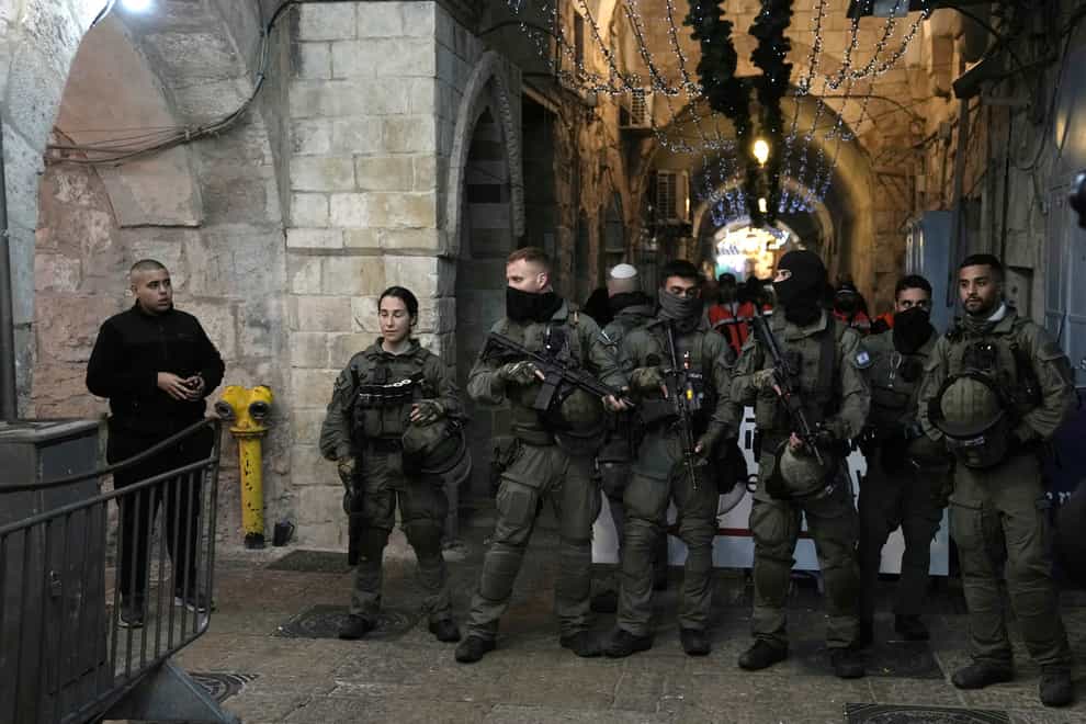 Israeli police in the Old City of Jerusalem, hours after police raided the Al-Aqsa Mosque compound (Mahmoud Illean/AP)