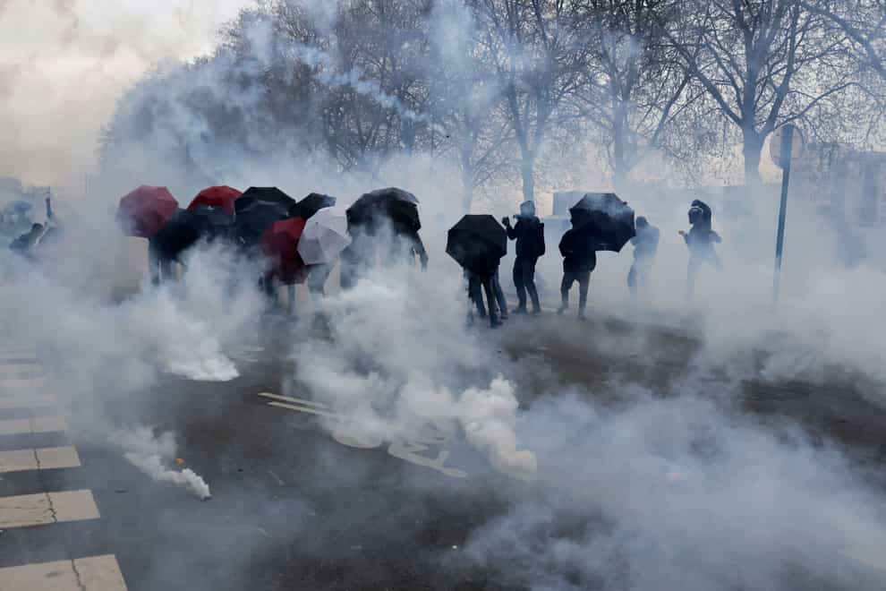 Youths clash with police in Nantes (Jeremias Gonzalez/AP)