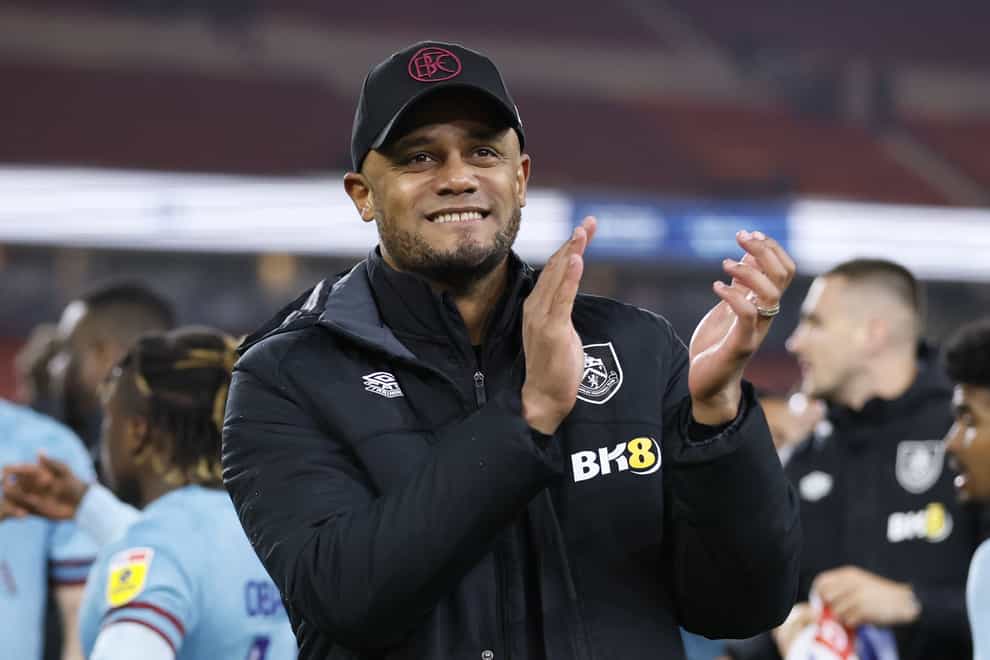 Burnley manager Vincent Kompany celebrates winning promotion back to the Premier League (Richard Sellers/PA)