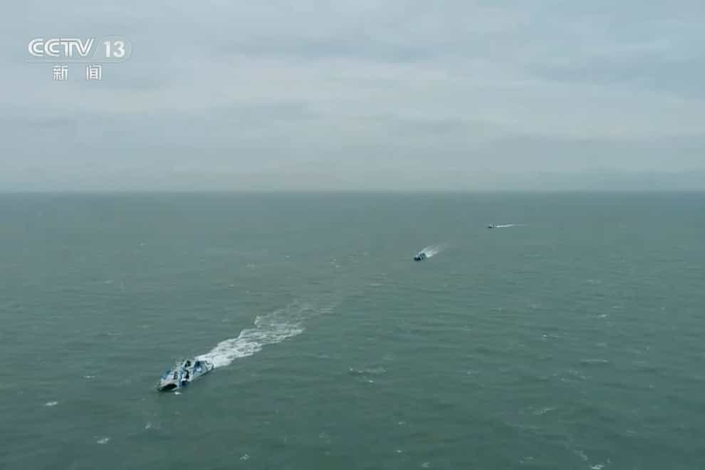 Chinese TV showed warships sailing in the Taiwan Strait (CCTV via AP)
