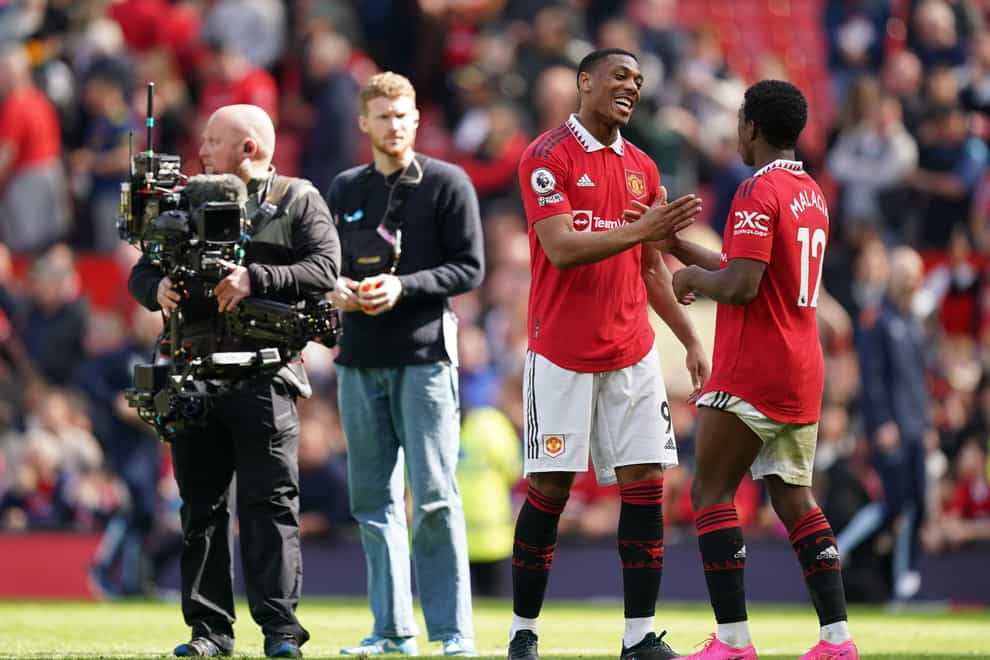 Manchester United’s Anthony Martial and Tyrell Malacia at full time after the Premier League match at Old Trafford, Manchester. Picture date: Saturday April 8, 2023.