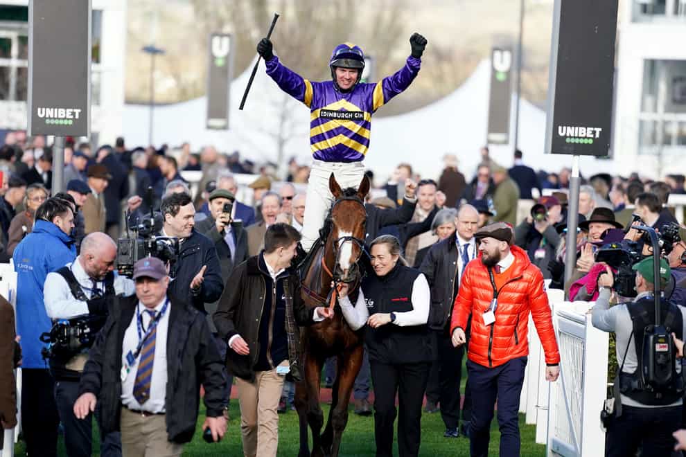 Derek Fox celebrates victory after winning the Ultima Handicap Chase aboard Corach Rambler on day one of the Cheltenham Festival (Mike Egerton/PA)