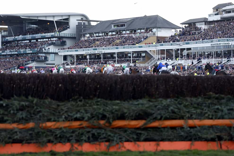 Runners and riders during the Randox Grand National Handicap Chase on Grand National Day of the Randox Health Grand National Festival 2022 at Aintree Racecourse, Liverpool. Picture date: Saturday April 9, 2022.