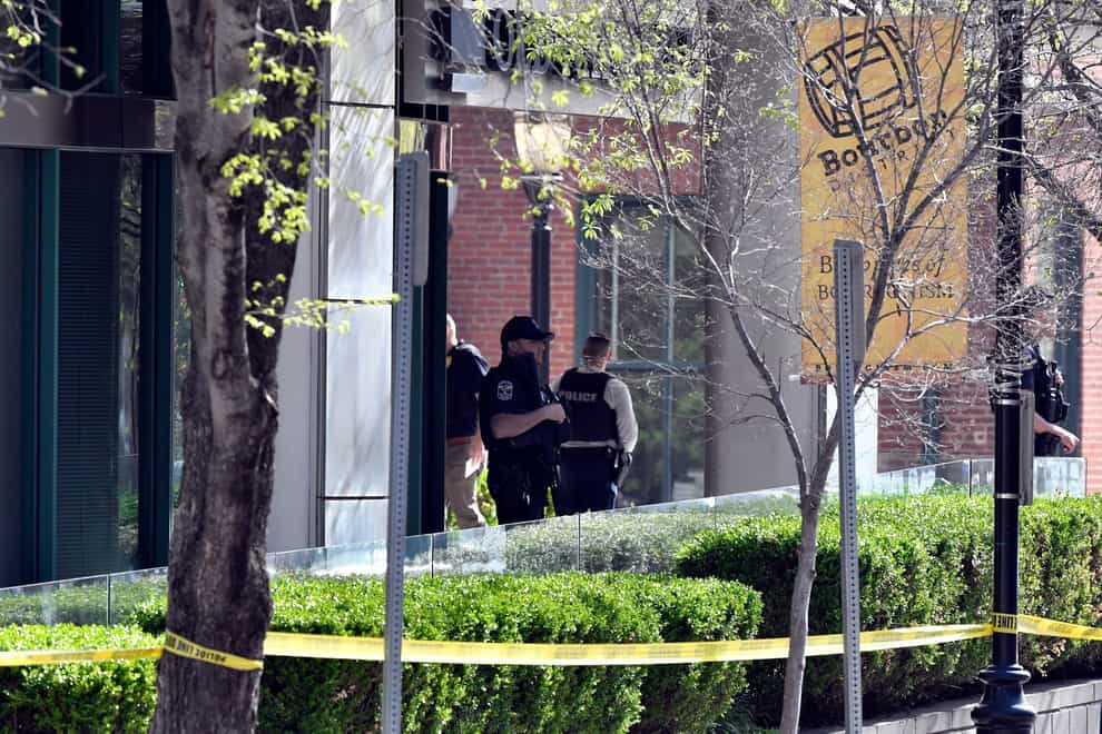 Police at the scene in Louisville (Timothy D Easley/AP)