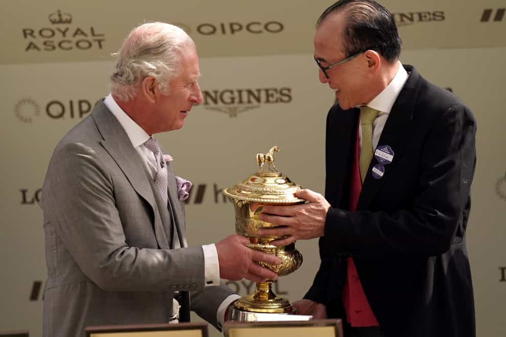 The Prince of Wales presents the trophies for the Prince Of Wales’s Stakes during day two of Royal Ascot at Ascot Racecourse. Picture date: Wednesday June 15, 2022.