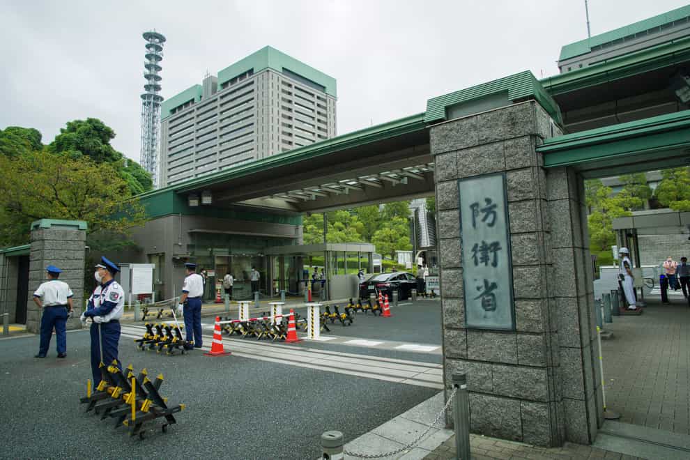 Japan’s Defence Ministry announced Tuesday it has signed contracts worth nearly 380 billion yen (£2.2 billion) with Mitsubishi Heavy Industries to develop and mass produce long-range missiles. This photo shows an exterior view of the Defence Ministry of Japan with its sign at the main entrance in Tokyo. (Hiro Komae, AP Photo)