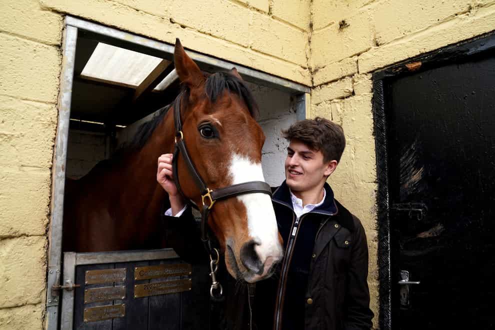 Cameron Sword, one of Corach Rambler’s owners, with the Grand National favourite (Andrew Milligan/PA)