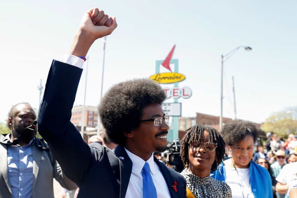Justin Pearson arrives at the Civil Rights Museum in Memphis, Tenn., before marching to the Shelby County Board of Commissioners meeting on Wednesday, April 12, 2023, where it is expected Pearson will be reinstated to his position in the Tennessee House. (Chris Day /The Commercial Appeal via AP)