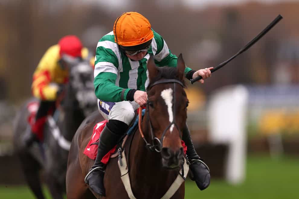 Authorised Speed ridden by jockey Jamie Moore on their way to winning the Brian Giles Memorial ‘National Hunt’ Novices’ Hurdle during day two of The Betfair Tingle Creek Festival at Sandown Park Racecourse, Esher. Picture date: Saturday December 3, 2022. (Steven Paston/PA)