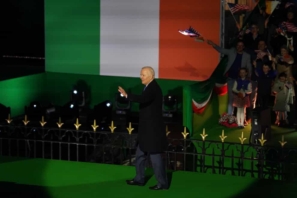 US president Joe Biden on stage (Brian Lawless/PA)