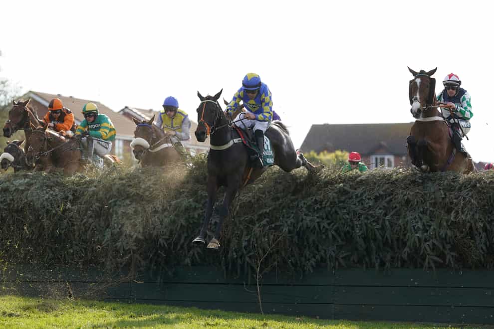 Roi Mage ridden by Felix De Giles jumps Beechers Brook during the Randox Grand National Handicap Chase during day three of the Randox Grand National Festival at Aintree Racecourse, Liverpool. Picture date: Saturday April 15, 2023. (Tim Goode/PA)