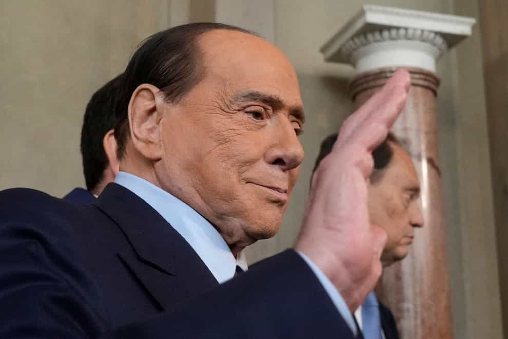Forza Italia president Silvio Berlusconi waves to press as he leaves the Quirinale Presidential Palace in Rome (Gregorio Borgia/AP/PA)