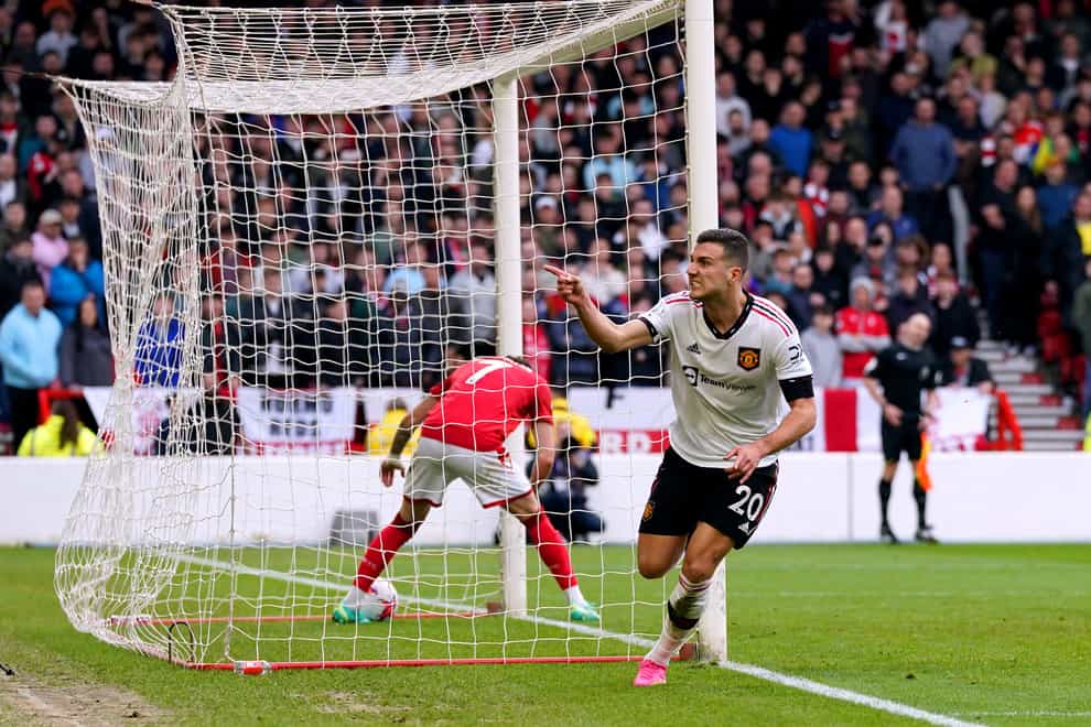 Manchester United’s Diogo Dalot celebrates scoring their side’s second goal of the game during the Premier League match at the City Ground, Nottingham. Picture date: Sunday April 16, 2023.