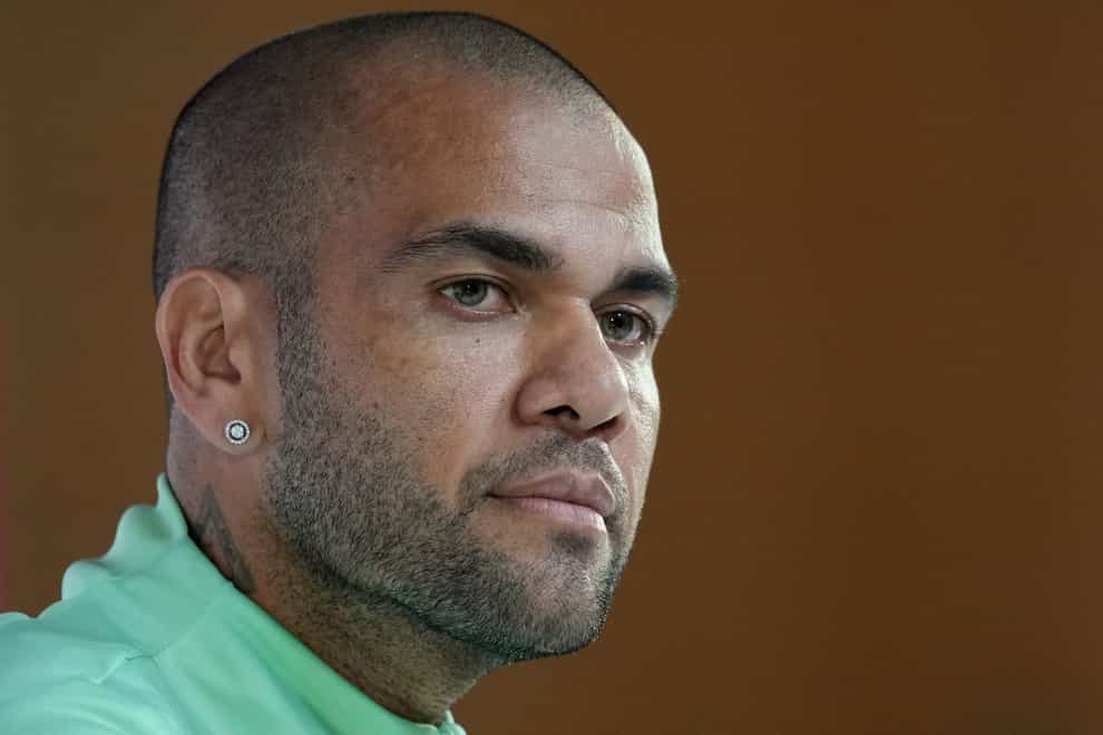 Brazilian footballer Dani Alves has appeared in court in Spain on to give evidence to a judge investigating a sexual assault accusation against the player (Andre Penner/AP)