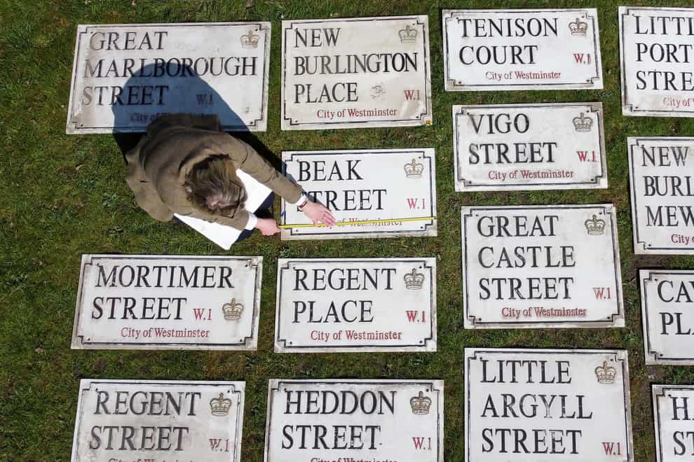 Auctioneer Catherine Southon catalogues 1950s/1960s London street signs (Gareth Fuller/PA)