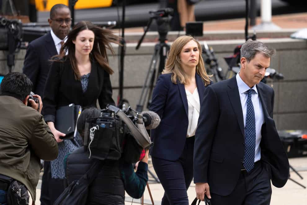 Representatives of Fox News arrive at the justice centre in Wilmington, Delaware, for the Dominion Voting Systems’ defamation lawsuit against Fox News (Matt Rourke/AP/PA)