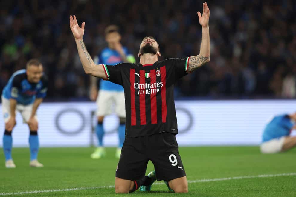 AC Milan’s Olivier Giroud celebrates his goal at Napoli (Alessandro Garofalo/AP/PA)
