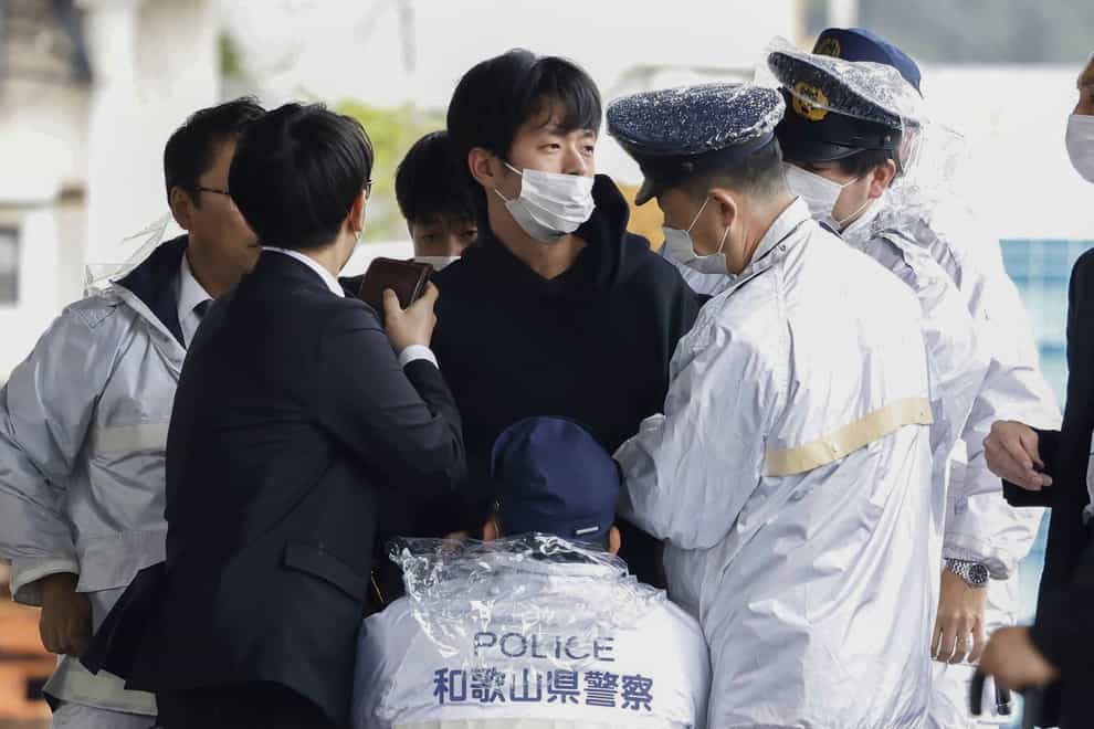 Ryuji Kimura is arrested after what appeared to be a pipe bomb was thrown at Japanese Prime Minister Fumio Kishida (Kyodo News via AP, File)