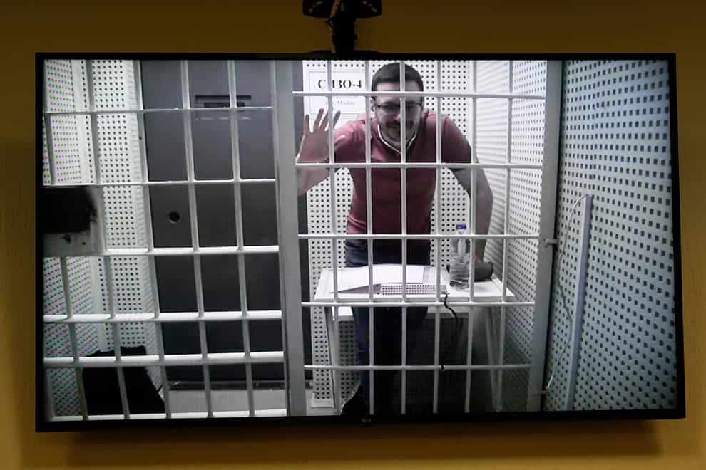 Ilya Yashin appears in court via video link (AP)