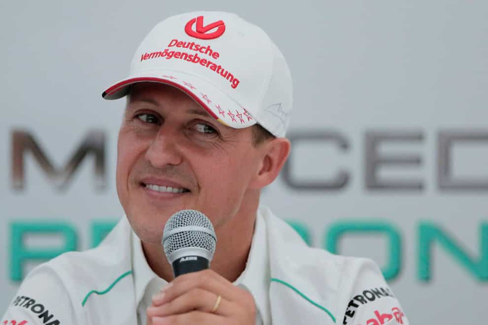 A German publisher has fired one of its magazine’s editors and apologised to the family of Michael Schumacher for publishing a fake interview generated by AI (Itsuo Inouye/AP/PA)