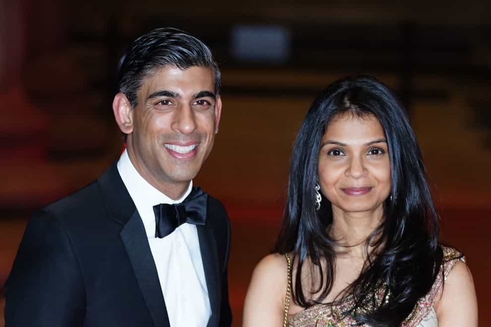 Rishi Sunak and his wife Akshata Murty (Ian West/PA)