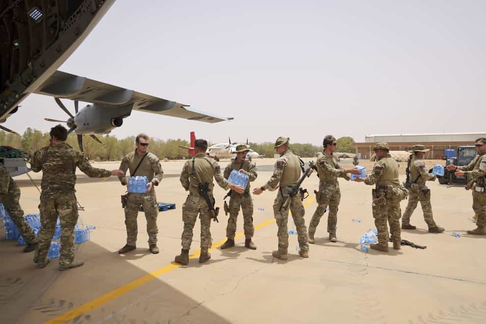 UK military personnel unloading stores in Khartoum for British nationals who will be evacuated from Sudan. (PO Phot Arron Hoare/PA)